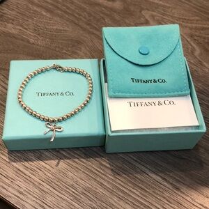 Tiffany & Co., Bead Bracelet with Bow Charm in Sterling Silver